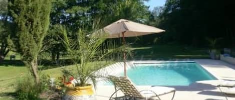 Outdoor pool, pool umbrellas, pool loungers