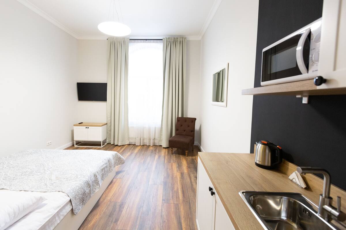 Chambre Supérieure, 1 grand lit 1 place, non-fumeur, vue ville