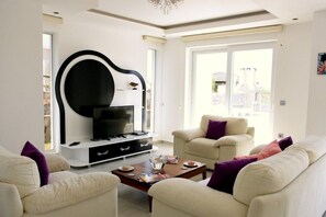 Villa, 4 Bedrooms, Private Pool | Living room | Flat-screen TV