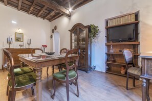 Apartment, 1 Bedroom | Living area | Flat-screen TV
