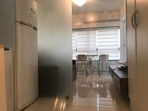 Comfort Apartment, 1 Double Bed, Non Smoking, Beach View | Private kitchen | Fridge, microwave, oven, cookware/dishes/utensils