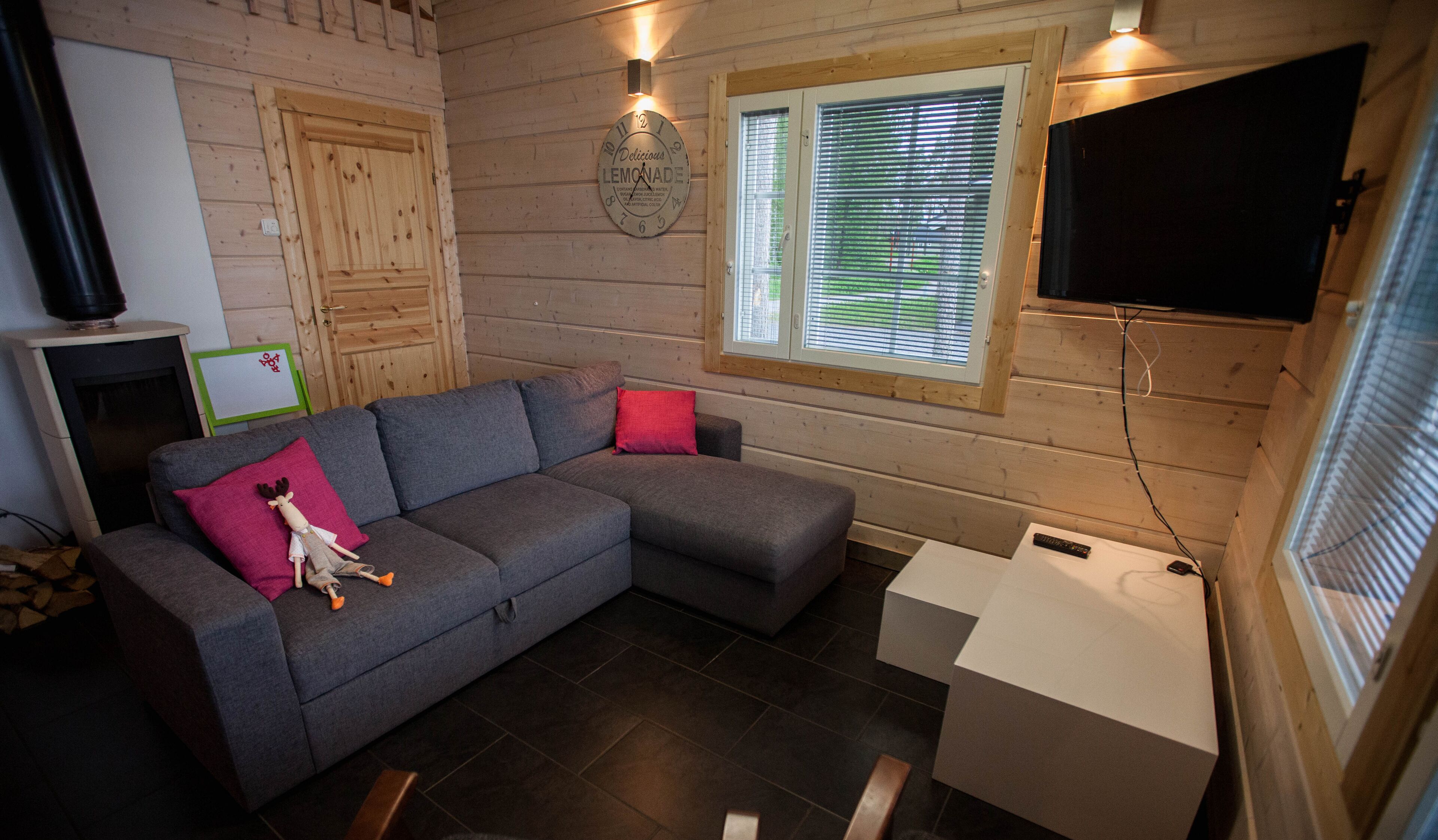 Sauna Villa with 2 bedrooms and private beach | Living area | 32-inch flat-screen TV with satellite channels, TV, fireplace