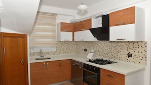 Vila, 4 kamar tidur | Dapur pribadi | Oven, kompor, dan peralatan masak/sendok-piring