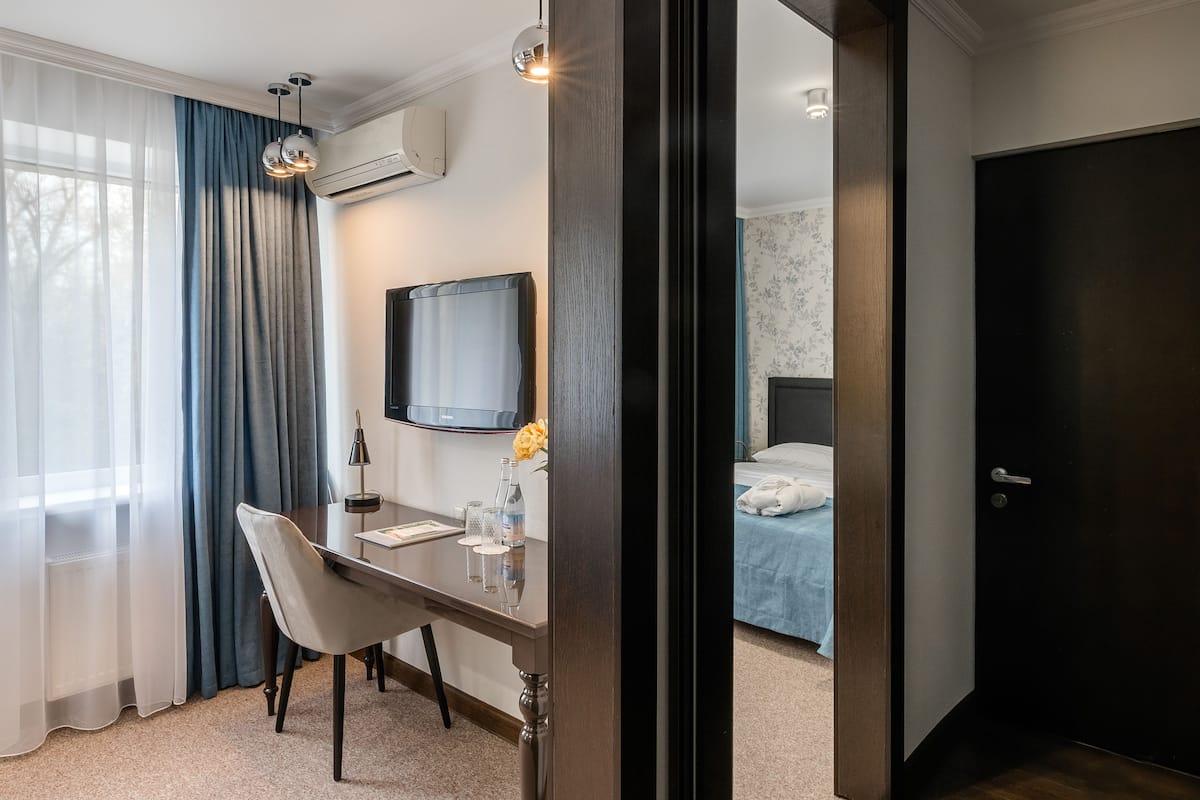 Business-Doppelzimmer | Zimmersafe, Verdunkelungsvorhänge, Bügeleisen/Bügelbrett