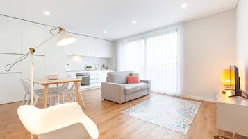 Apartment, 1 Bedroom, Terrace (5) | Living area | 32-inch flat-screen TV with cable channels, TV