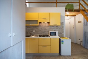 Duplex | Private kitchen | Fridge, microwave, stovetop, cookware/dishes/utensils