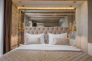 Premium bedding, memory-foam beds, minibar, in-room safe