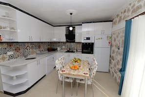 Villa, 2 Bedrooms, Non Smoking, Private Pool | Private kitchen | Full-size fridge, microwave, oven, stovetop