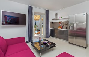 Superior Apartment, 2 Bedrooms, Pool View | Living area | 35-inch flat-screen TV with satellite channels, TV - Apartments St Thomas (Dubrovnik)