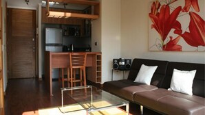 Apartment, Multiple Beds, Non Smoking | Living area | Flat-screen TV - Travel Place Lyon (Santiago)