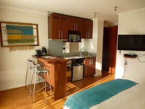 Apartamento, 1 cama de casal e sofá-cama, para não fumantes | Cofres nos quartos, escrivaninha, ferros/tábuas de passar roupa