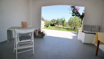 Quarto conforto | Terraço/pátio