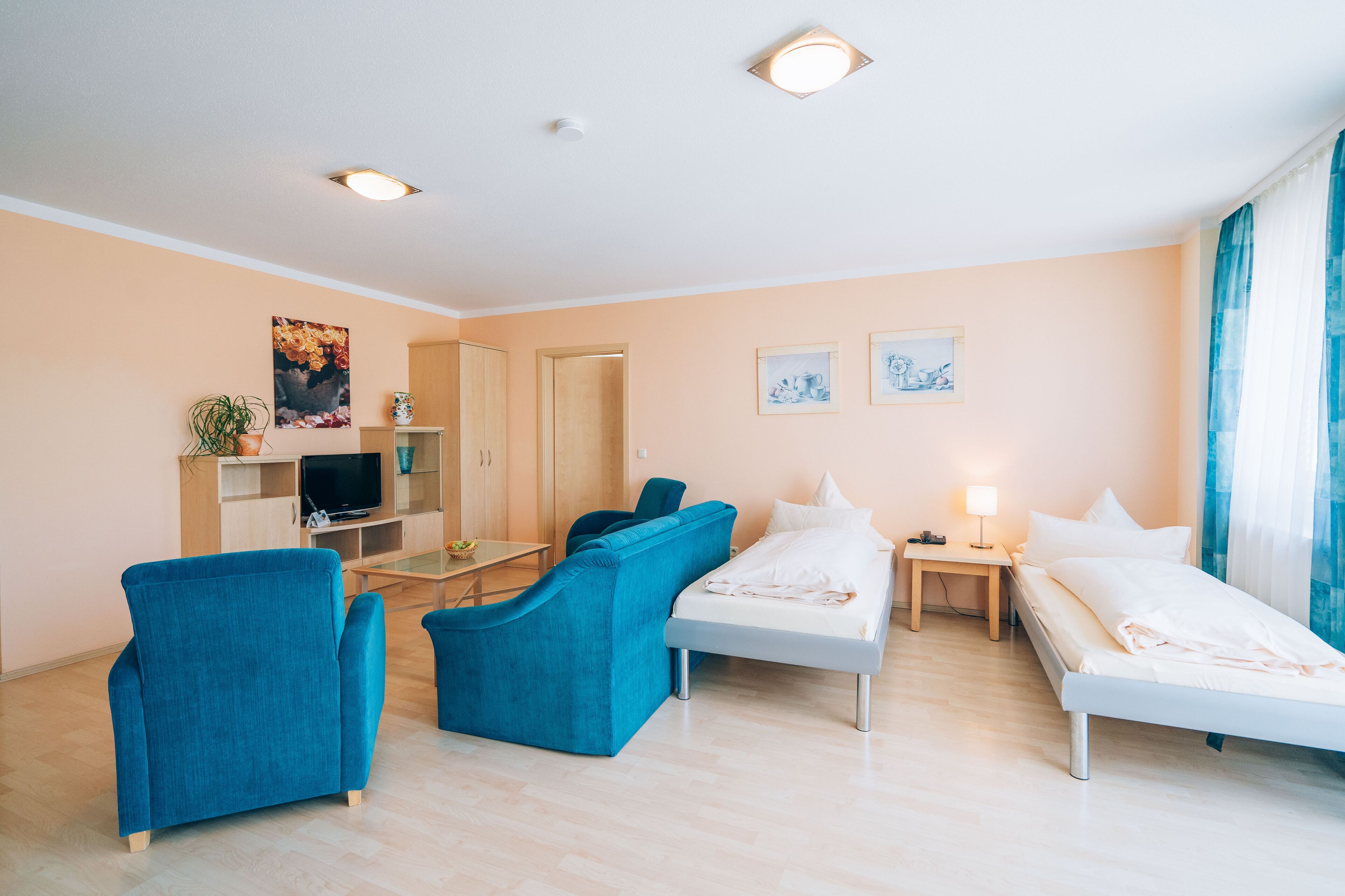 Comfort Apartment | Living area | Flat-screen TV