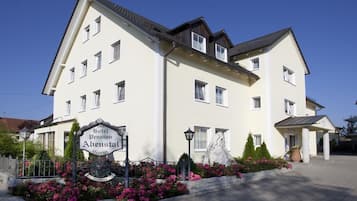 Traditional architecture welcomes guests to this charming establishment.