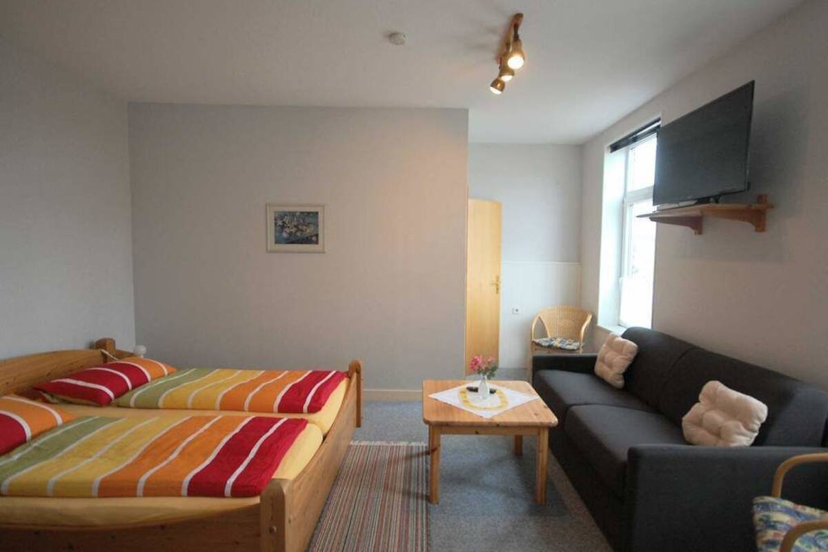 Desk, cots/infant beds, free WiFi, bed sheets