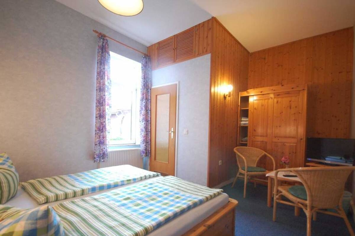 Desk, cots/infant beds, free WiFi, bed sheets