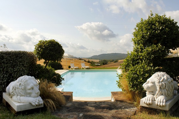 Seasonal outdoor pool, open 8:00 AM to 7:00 PM, pool umbrellas