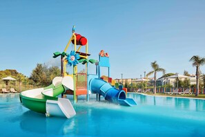 A water park with slides and a pool. - Tivoli Alvor Algarve - All Inclusive Resort (Portimão)