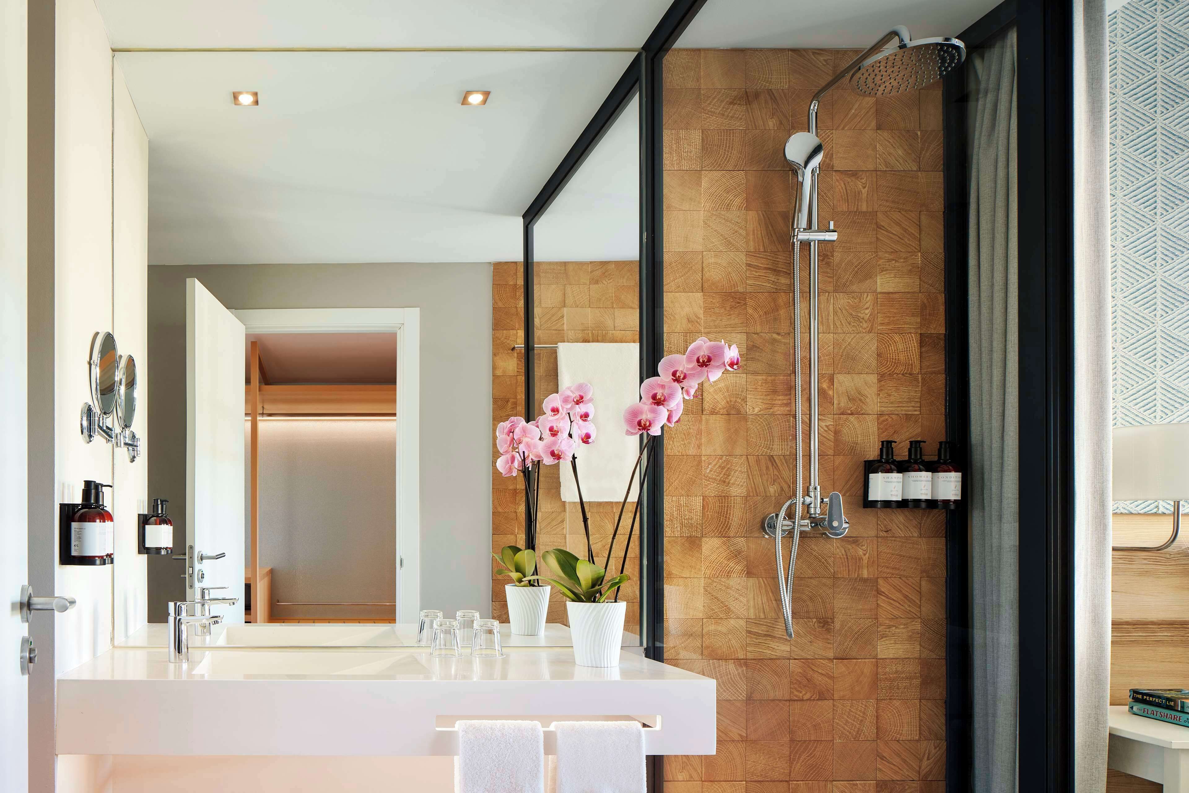 Eco-friendly toiletries, hair dryer, bathrobes, towels