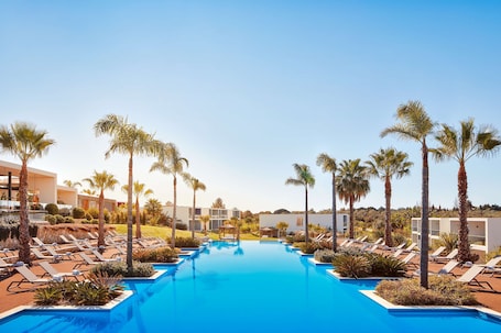 Indoor pool, 6 outdoor pools, open 9:00 AM to 7:00 PM, sun loungers