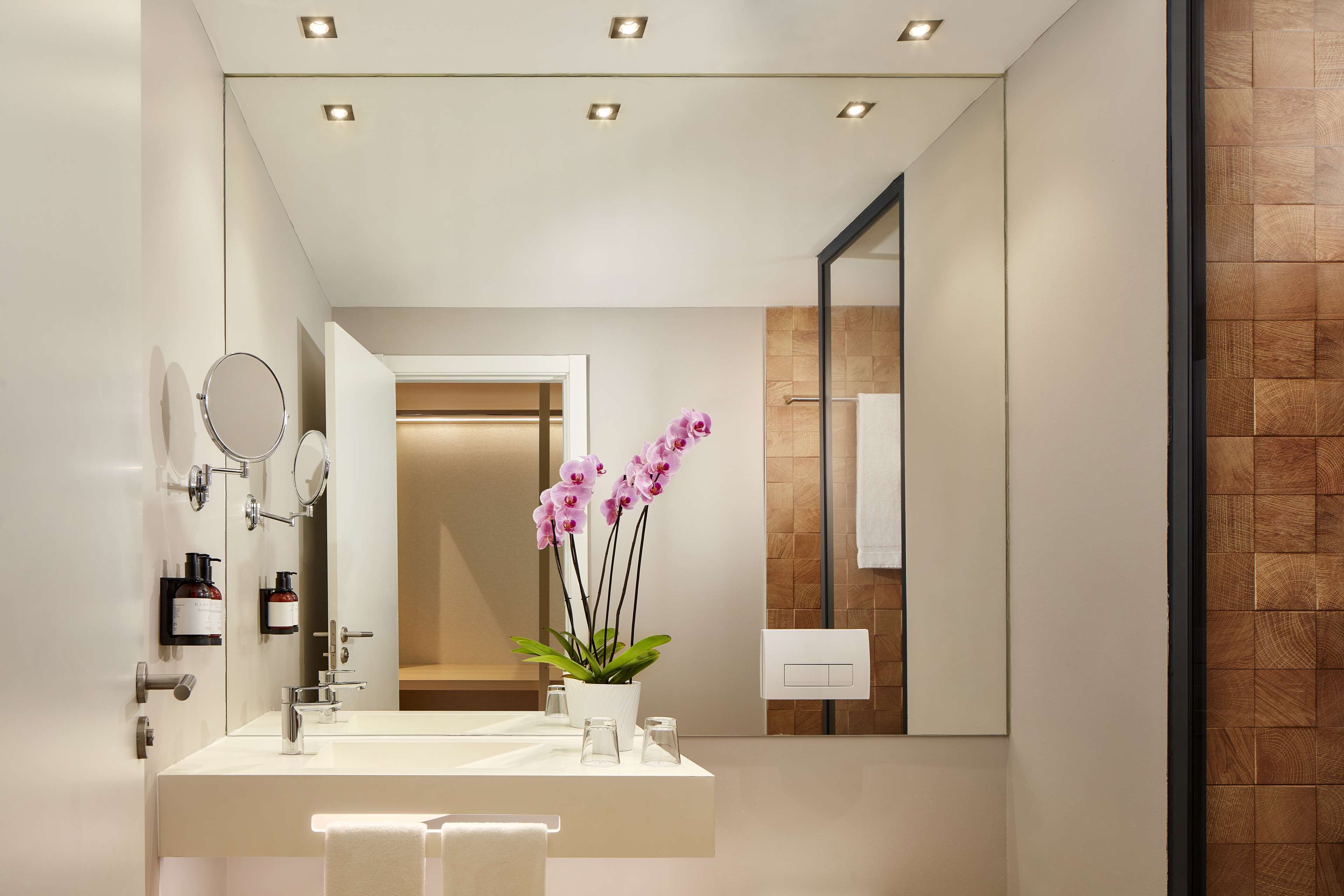 eco-friendly toiletries, hair dryer, bathrobes, towels