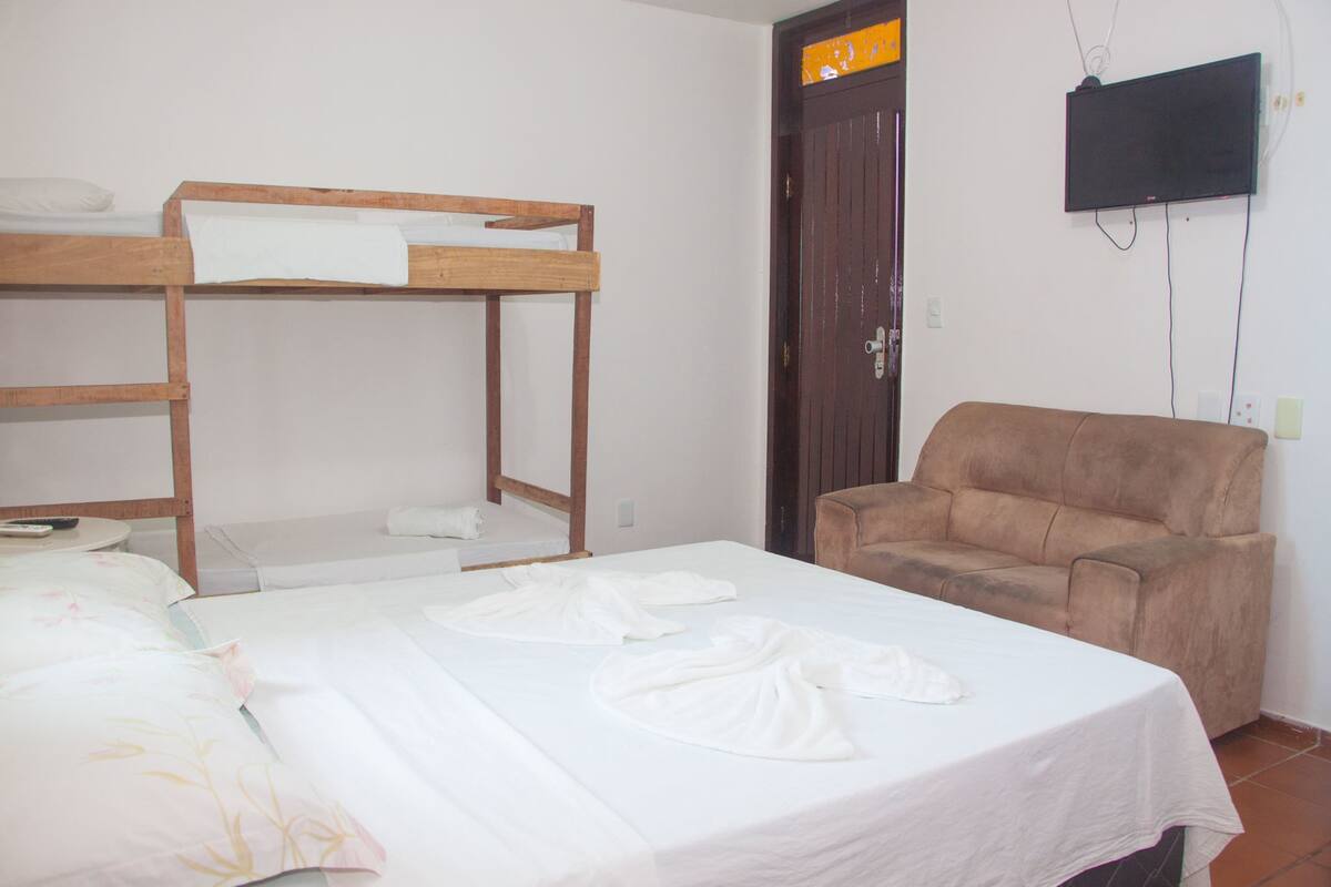 Quadruple Room | Minibar, blackout drapes, WiFi (free), bed sheets