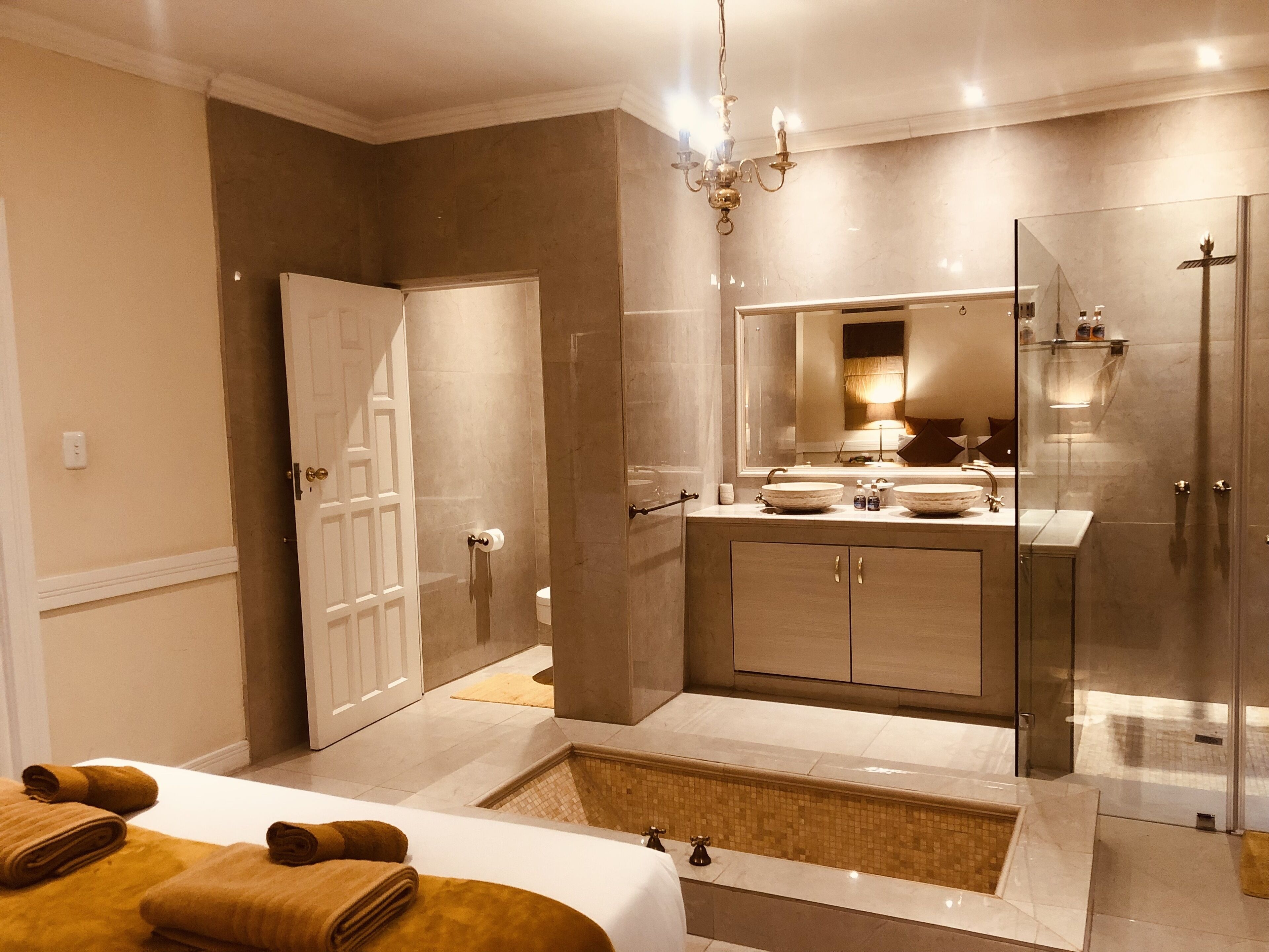 Orange Apartment | Living area | Flat-screen TV