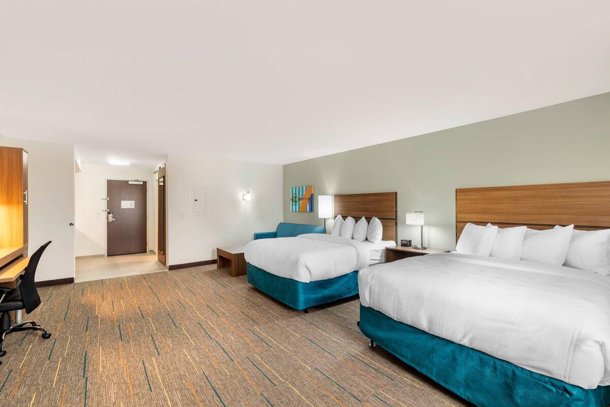Suite, Multiple Beds, Non Smoking | Pillowtop beds, desk, iron/ironing board, WiFi (free)