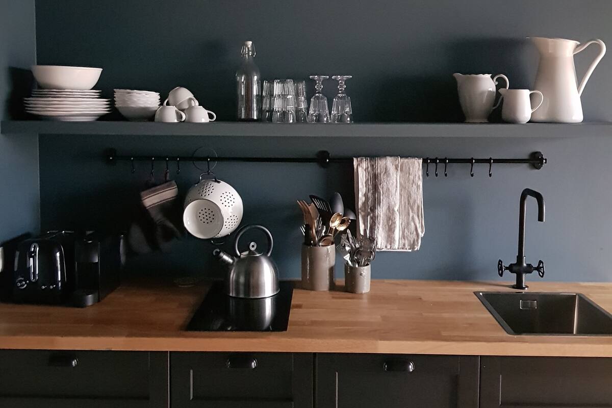 Espresso maker, coffee/tea maker, fridge, stovetop