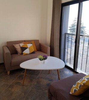Exclusive Apartment, 1 Queen Bed with Sofa bed, Non Smoking, River View | Living room
