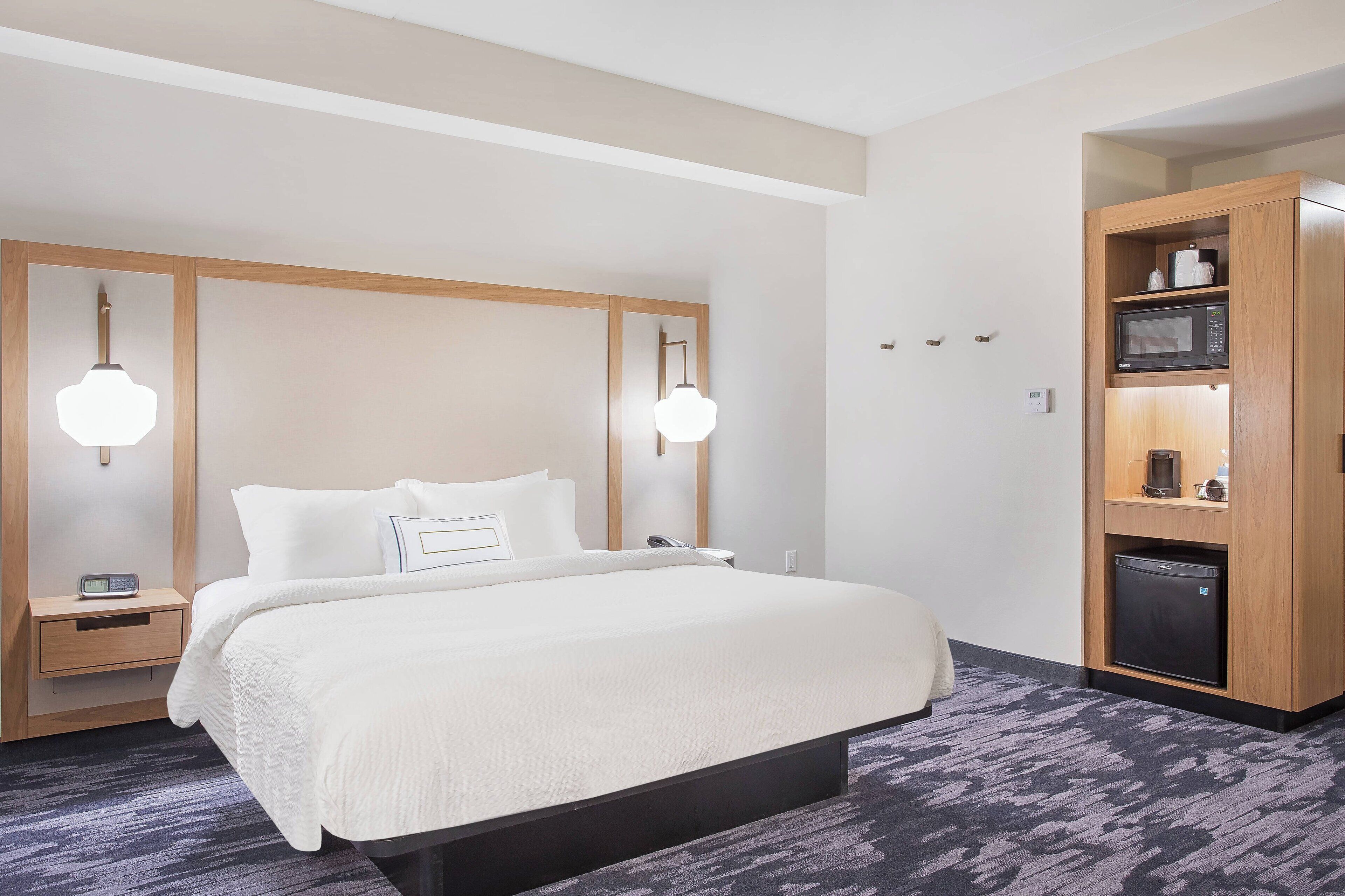 desk, blackout curtains, iron/ironing board, cots/infant beds