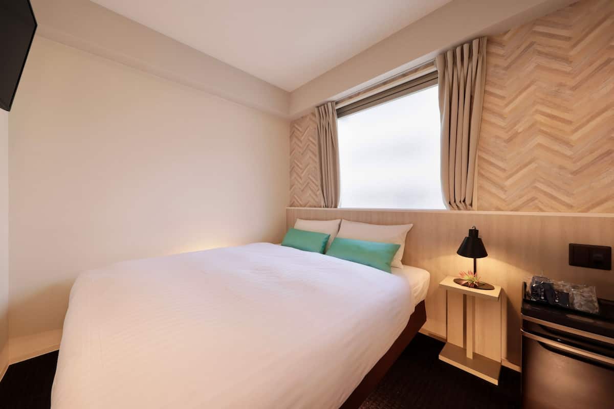 Blackout drapes, iron/ironing board, free WiFi, bed sheets