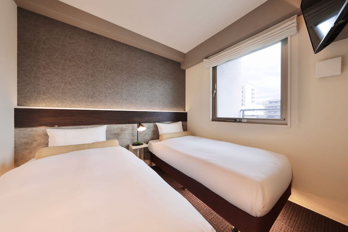 Standard Twin Room | Blackout curtains, iron/ironing board, free WiFi, bed sheets
