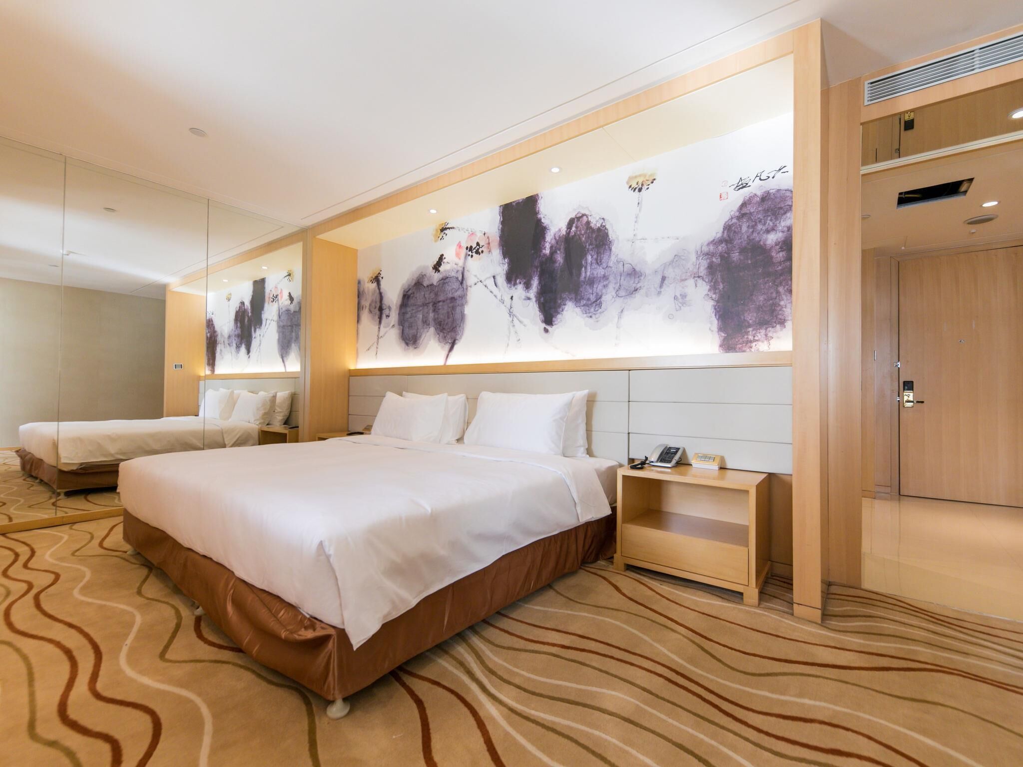 Deluxe Suite, 1 King Bed | Minibar, desk, laptop workspace, blackout drapes