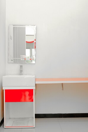 Deluxe-sviitti | Kylpyhuoneen pesuallas