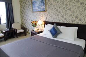 Habitación Deluxe con 1 cama matrimonial o 2 individuales | Minibar, escritorio y wifi gratis 