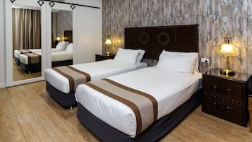 Deluxe Twin Room | In-room safe, individually decorated, desk, blackout curtains