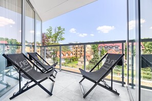 ดีลักซ์อพาร์ทเมนท์, 1 ห้องนอน | ลานระเบียง/นอกชาน