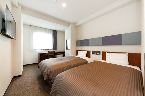 Twin Room, Non Smoking | Desk, blackout drapes, free WiFi, bed sheets