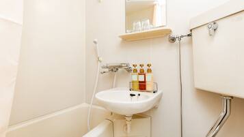 Combined shower/tub, deep soaking tub, hair dryer, slippers
