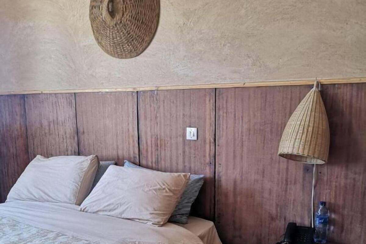 Desk, blackout curtains, free WiFi, bed sheets