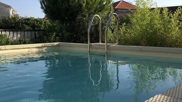 Seasonal outdoor pool, sun loungers