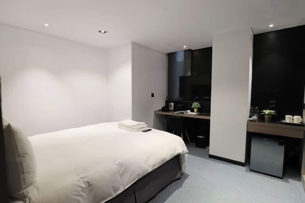Desk, free WiFi, bed sheets