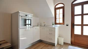 Apartment | Private kitchen | Microwave, electric kettle