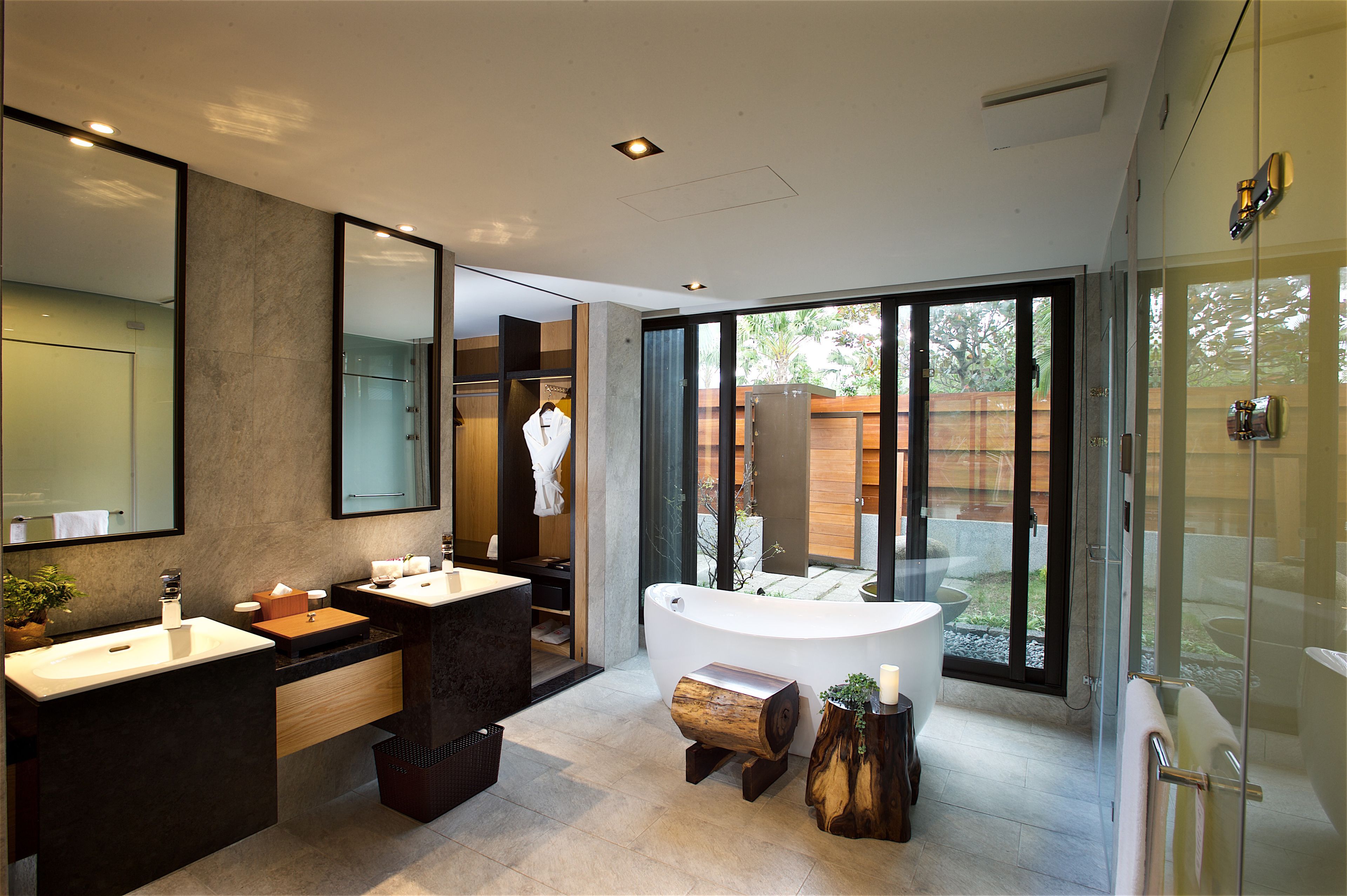 elegant chamomile villa | bathroom | separate bathtub and shower, rainfall showerhead, designer toiletries