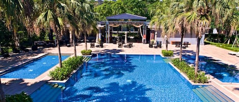 Outdoor pool, open 8:00 AM to 9:00 PM, pool umbrellas, sun loungers