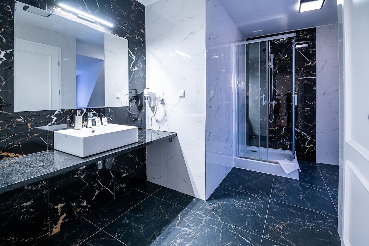 comfort double room | bathroom | eco-friendly toiletries, hair dryer, towels, soap