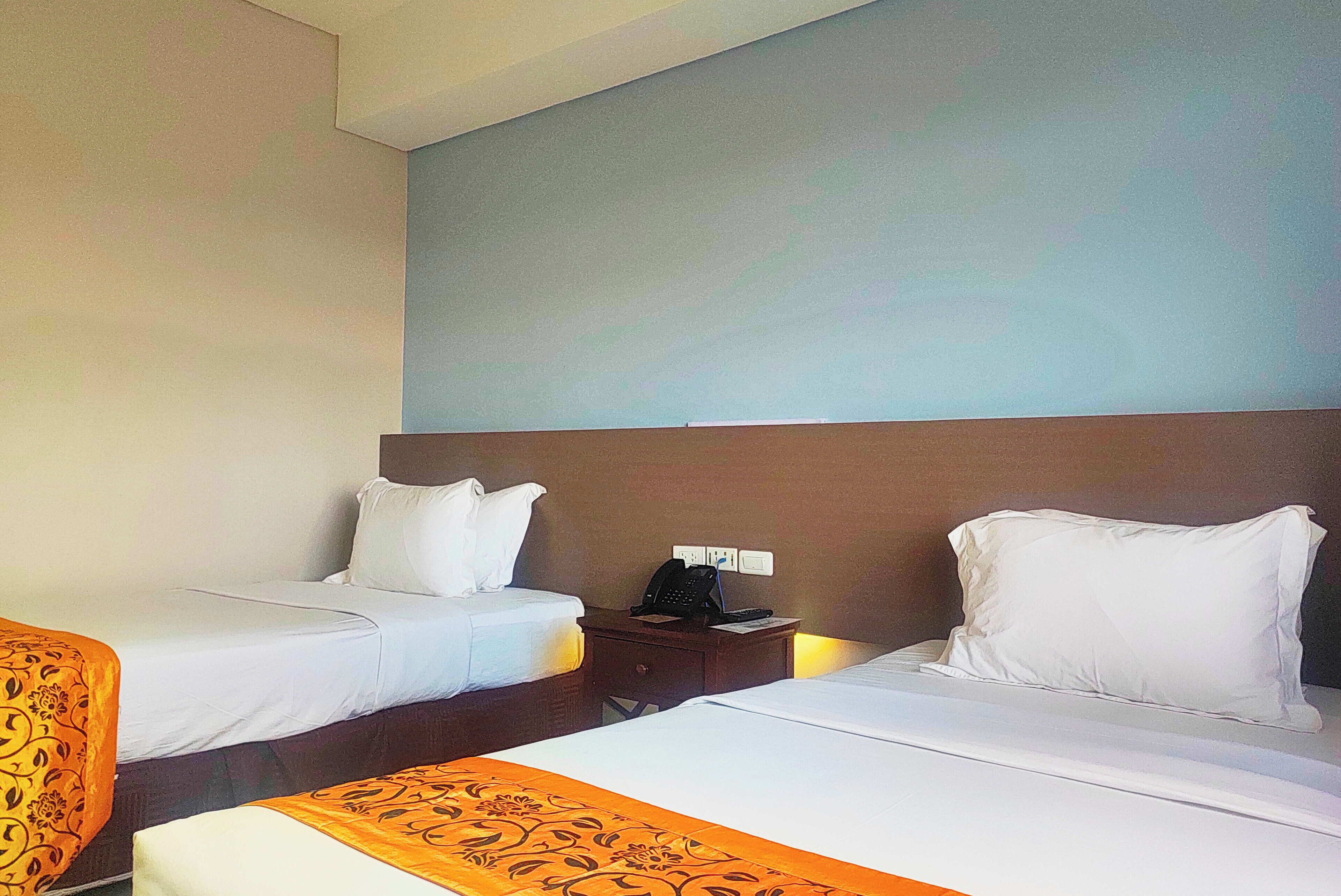 deluxe twin room | free wifi, bed sheets, wheelchair access