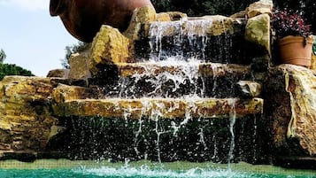Outdoor pool, open 9:00 AM to 11:30 PM, pool umbrellas, sun loungers