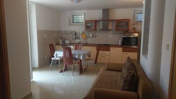 Leilighet, 1 soverom | Oppholdsområde | Flatskjerm-TV